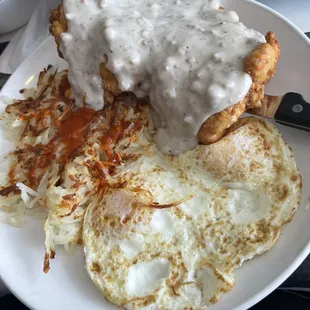 Two eggs with country fried chicken