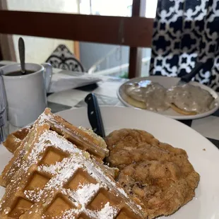 a plate of waffles and cookies