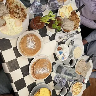 a table full of breakfast foods