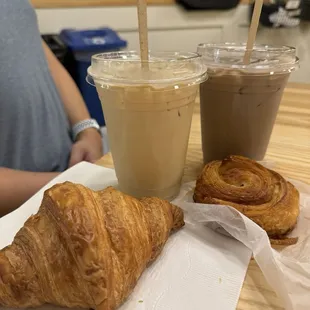 Butter croissant, kouign amann, iced latte with pistachio and ube flavor