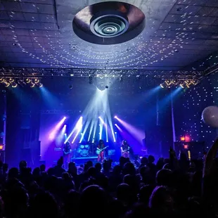 a band performing on stage