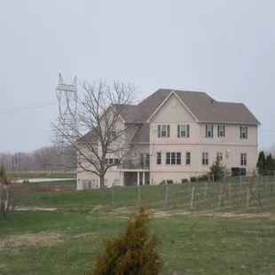 a large house in a field
