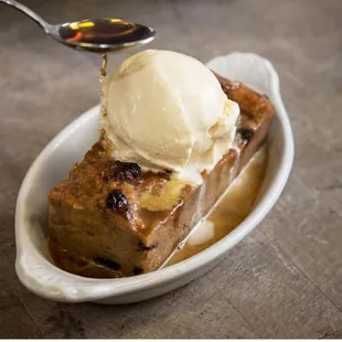 Bread Pudding drizzled in whiskey sauce, al a mode