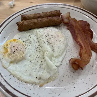 Other half of French toast special. Eggs over medium with a lot of black pepper!