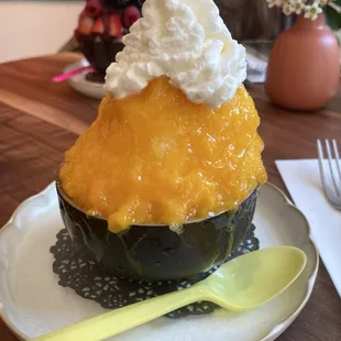 Custom Snowy Single Scoop (Mango Sorbet, Mango Yuzu Syrup, Added Whipped Cream)