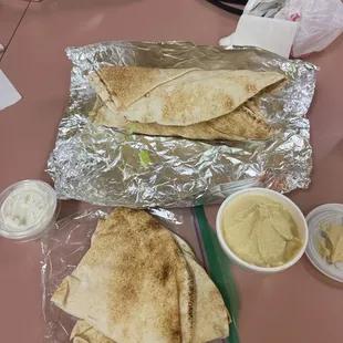 chicken schwarma, pita bread, hummus