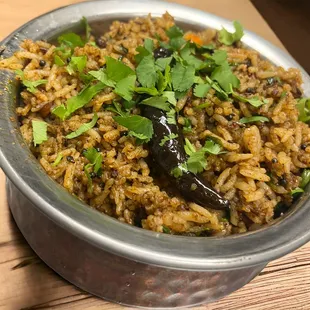 a bowl of rice and vegetables