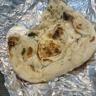 Same shape and texture as Trader Joe's Naan. 100%