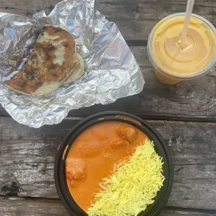 ig: @whatsviveating  |  chicken tikka masala, garlic naan, and mango lassi