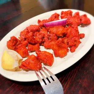 a plate of food with a fork