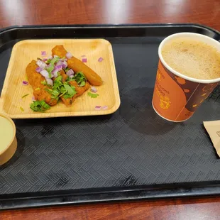 Daily $5 special - mirchi bhaji (peppers fried in a chickpea flour batter) and a cup of filter coffee