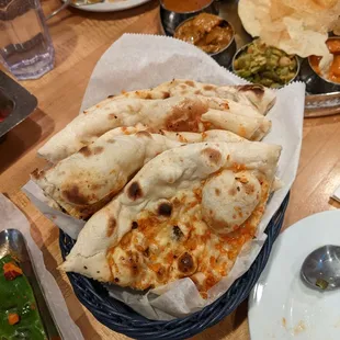 Two pieces of garlic naan.