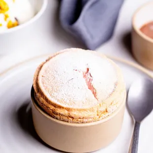 a dessert on a plate with a spoon