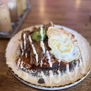 Chilaquiles Rojo with Birria and two eggs