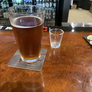 a pint of beer and a shot of water