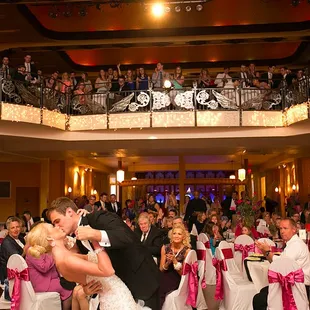 a bride and groom sharing their first dance