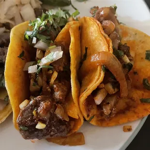three tacos on a plate