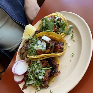 Pastor tacos and a Chorizo Taco. Perfect seasoning, sparse grease, and grilled onions for a beautiful touch.