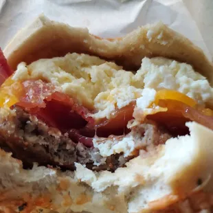 Bacon, sausage, egg and cheese on a Asiago bun. Bomb-digity!