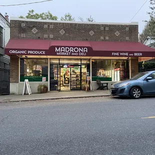 a car parked in front of the store