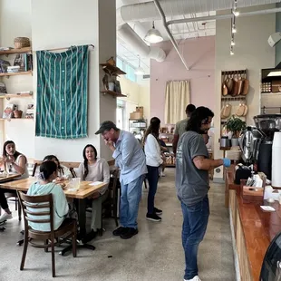 a group of people sitting at tables