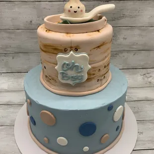 a cake with a baby in a tub
