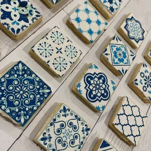 a collection of blue and white tiles