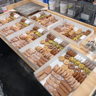 Have a large event?-THIS is what 30 dozen looks like ready for delivery! - We can  decorate the sprinkle donuts in the color of YOUR choice.