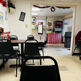 a restaurant with tables and chairs