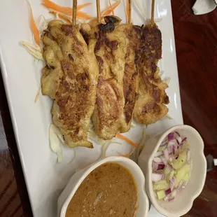 Chicken Satay with peanut sauce! A must this is delicious
