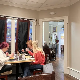 two women sitting at a table