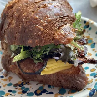 Breakfast croissant sandwich with added greens!