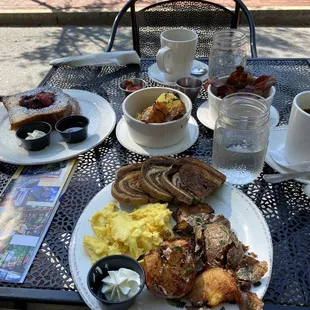 French toast with a whiskey honey syrup and eggs, potatoes and home fries.