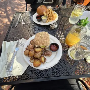 Burger and fries , and they're chicken sandwiche