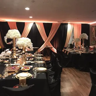 a restaurant setting with black tablecloths and black tablecloths