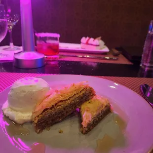 Desserts. Baklava and strawberry cheesecake.