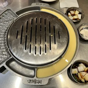 a grill with a lot of food on it