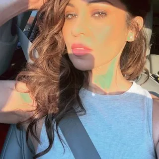 Adela T.