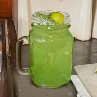 a lime margarita in a mason jar