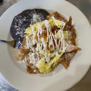 Chilaquiles with scrambled egg.