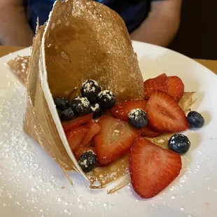 Seasonal crepe with strawberries and blueberries