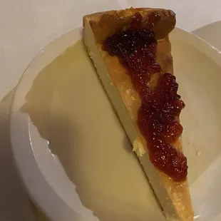 House made cheese cake with berry topping