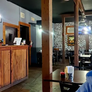 a man sitting at a table in a restaurant