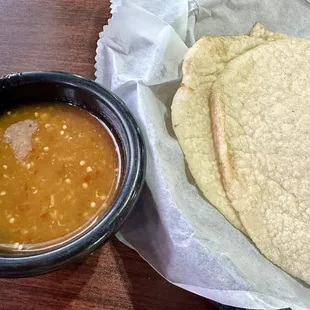 Homemade corn tortillas and spicy salsa (by request).