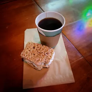 a cup of coffee and a snack