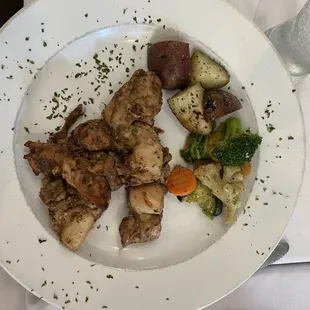 Mediterranean chicken with roasted vegetables and potatoes