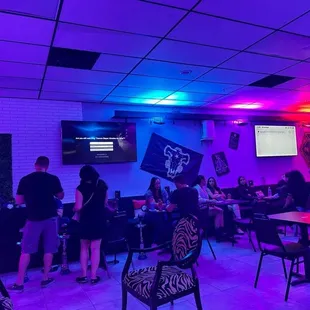 a group of people sitting at tables