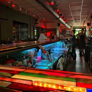 View of the long "stained glass" bar.