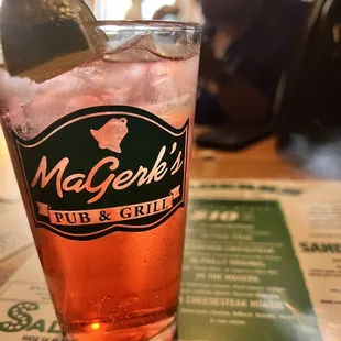 a drink with a lime wedge in it