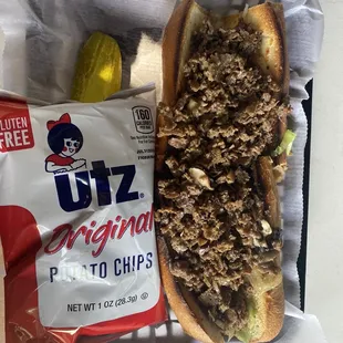 Philly cheesesteak hoagie with onions and mushrooms.